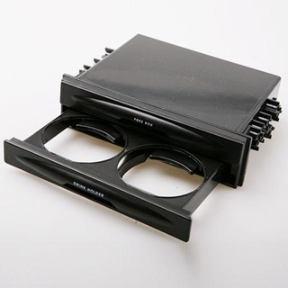 Illustration for article titled Anyone ever buy one of these DIN cupholders?